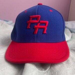 Puerto Rico cap with embroidered initials,flag and a WBC logo.